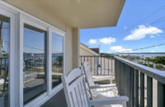 Private Balcony and Modern Comforts - Charming Beach Haven