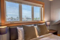 Fenced Backyard with Gas Fire Table and Luxurious Amenities - Gorgeous Coastal Retreat