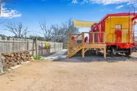 Charming Caboose Retreat with Steampunk Design - Unique and Cozy Escape