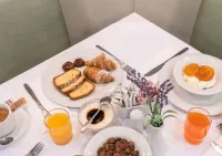 Le Grand Reve Apartments & Luxury Suites Hôtels à : Kalivia Poliyirou