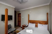 Palm Gardens and Guest House Hotels in Matugga