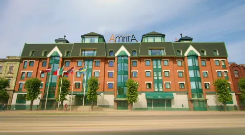 Amrita Hotel - بار