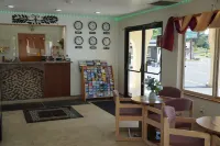 Timberland Inn & Suites