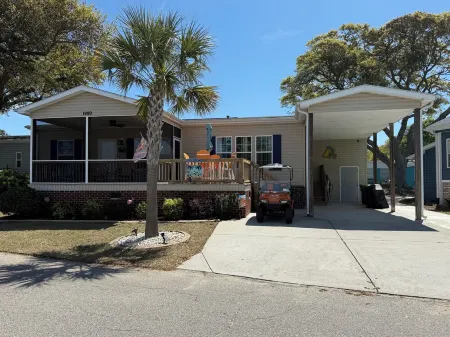 Lazy Pelican Beach House Отели в г. Серфсайд Бич