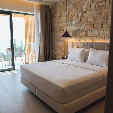 Drymades Inn Resort Отели рядом с достопримечательностью «Пляж Паласа»