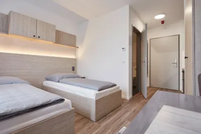 Bader Apartments Gmbh Отели в г. Унтершлайсхайм
