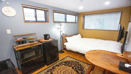 Container House Villa Kurokawa　 Отели рядом с достопримечательностью «Kohagiyamainari Shrine»