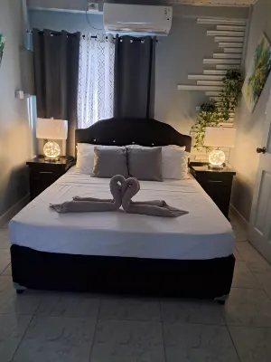 Breadfruit Lodge Bago Hotels near Store Bay Beach