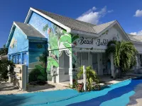 The Harvey Nicole: Modern Caribbean Ocean Front Condo Grand Cayman.