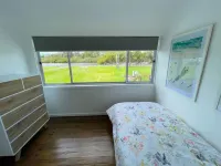 Lakeside House Tuncurry with deck overlooking the lake Hotels in Tuncurry