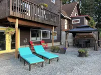 Baker View Lodging with hot tub, sound, mountain, and territorial views.