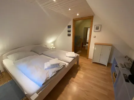 Relax under thatched roof between the seas