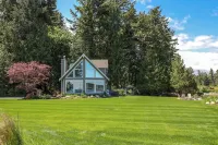 Open Design West Coast Home on 1600 Feet of Private Waterfront