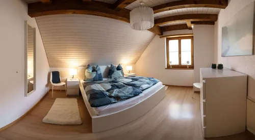 Beautiful penthouse duplex apartment with balcony surrounded by greenery