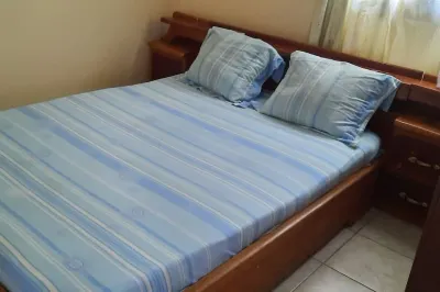 Nzecy Appart. A studio with a velvety, air-conditioned living room. Hôtels à proximité de : Leyisshopservice