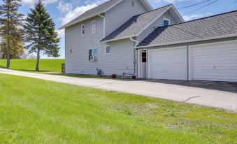 Walk to Beach Home with Game Room and Yard in Algoma!