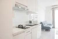 Homey and High Floor 2Br at Sky House BSD Apartment - Wifi