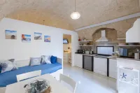 Stone-vaulted apartment in the very heart of the city's historic center.