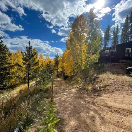 Aspen Glow Cabin - a charming 2-bedroom cabin with mountain views & wood stove