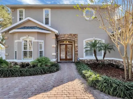 The American Dream House – Lakefront Luxury with 2 Heated Pools & Hot Tub