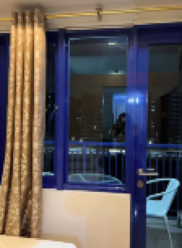 Cozy 1 bedroom condo in charming Pasay Mall Of Asia with AC, WiFi balcony Hotels in San Andres Bukid