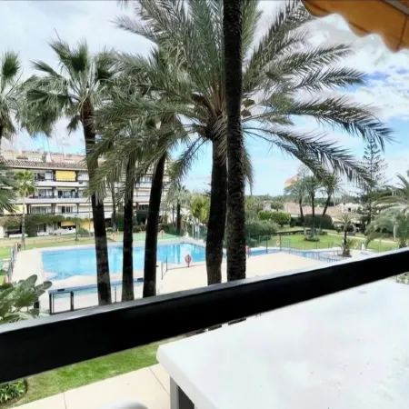 Studio in front of the pool