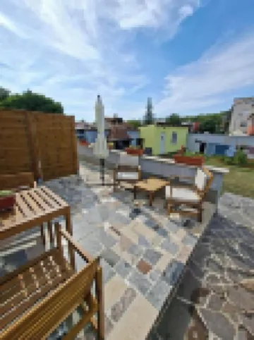 Newly built and decorated cute studio with a terrace overlooking the garden.