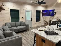 TAKE IT EASY Fishing Cabin. Large enclosed bay for storing the boat.
