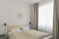 Turmvilla Ground Floor: Terrace with Pergola, Wood-Burning Stove and Water Access