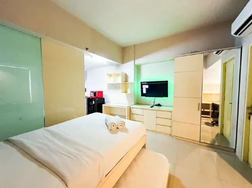 Modern Studio near Petra Christian University at The Square Surabaya Apartment By Travelio
