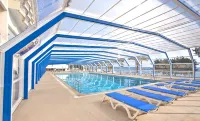 Poseidonia Beach Hotel - Parkplatz