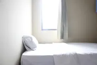 Minimalist 3Br Gateway Cicadas Ahmad Yani Apartment by Travelio