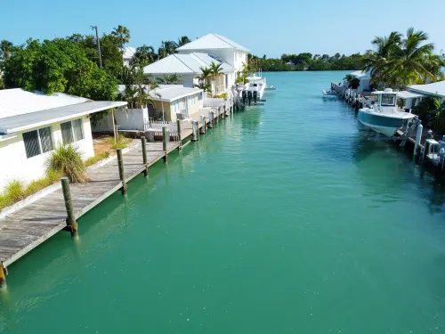 Oceanside waterfront 2/2 home with 55ft dock and paddle equipment