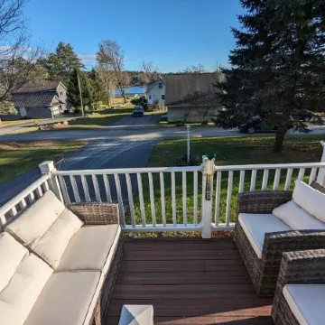 Cozy lake view home, centrally located with lake access and private dock!