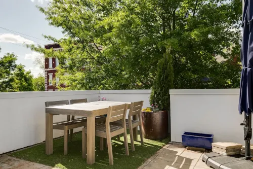 Elegant 3-Bedroom Home with Stunning Rooftop Deck & Dining Area