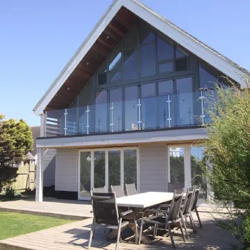 Beach Front Holiday Home on Private Estate with Sea Views.   100+  Reviews!