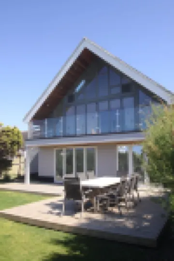 Beach Front Holiday Home on Private Road with Views Out to Sea. 100+  Reviews