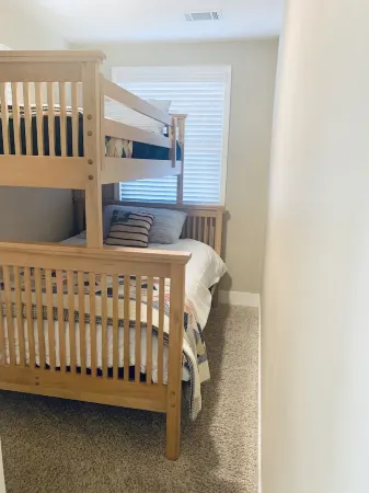 Right across from Beach and Grand Haven Pier!  Beautiful Lake and Sunset Views!