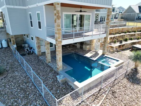 Shenanigans New Large  home steps from the water. Heated Pool hot tub boat slip