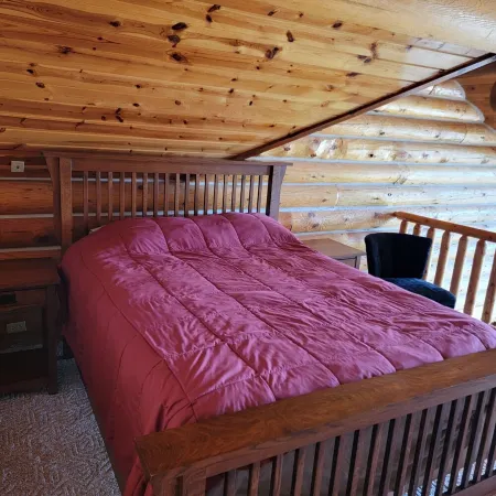 Large garage for bikes. Beautiful log home.  On golf course.