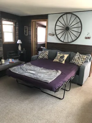 Dog friendly cozy red cottage near lakes and trails