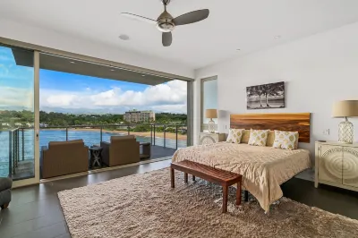 Modern Oceanfront Resort Living. 16' Ceilings. Luxury Oceanfront Bedroom Suites.