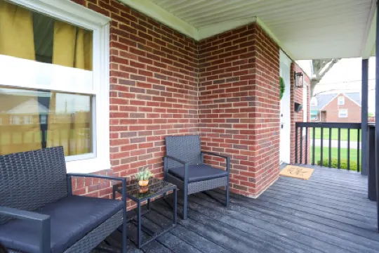 Touchdown Bungalow: Charming HOF Village Home