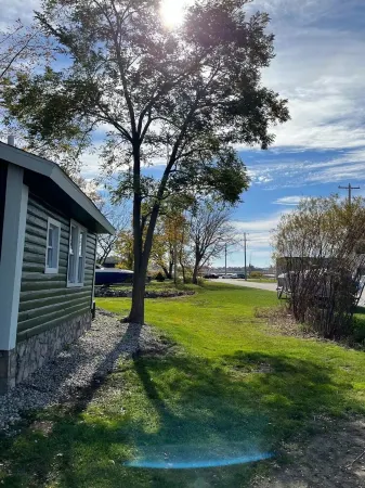 Charming log cabin Отели в г. Спринг-Лейк