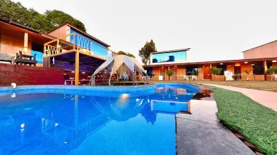 Arya Resort & Spa Отели рядом с достопримечательностью «Дхоби Уотерфолл»