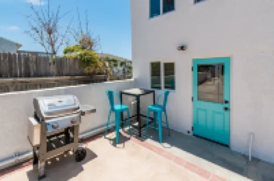 Stunning Ocean Views and Cozy Balcony - Charming Coastal Haven