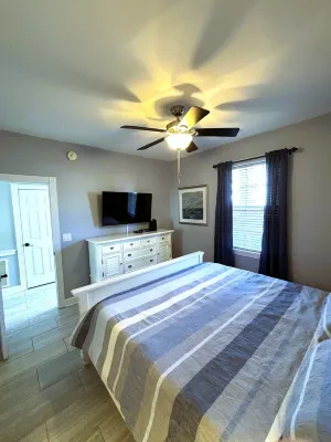 First Floor Updated Coastal Summer Retreat at Magnolia Place - Pool View