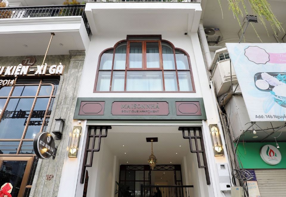 아늑하고 감성적인 Maison Nha 아파트의 내부 인테리어 사진입니다.