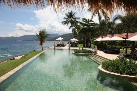 Sea Breeze Candidasa Отели рядом с достопримечательностью «Yeh Malet Beach»