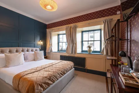 The Bugle Coaching Inn Отели рядом с достопримечательностью «Tapnell Farm Holiday Destination»